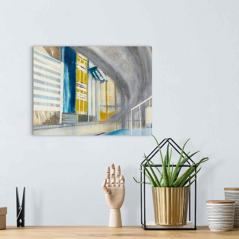 A bohemian room featuring Abstract painting of a winding overpass going through a cityscape.