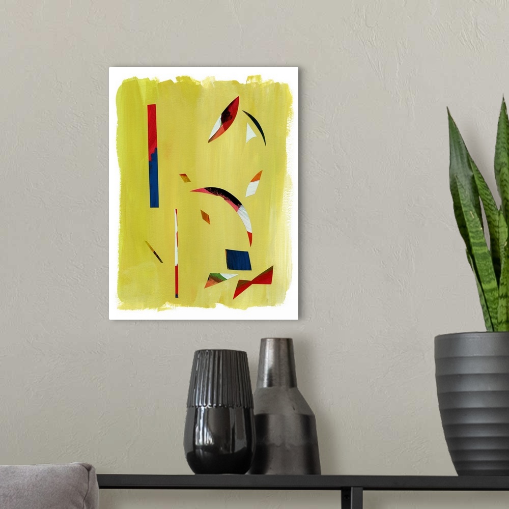 A modern room featuring Mod abstract art with red and blue shapes on green.