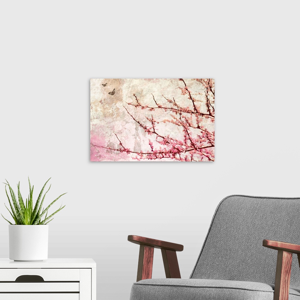 A modern room featuring Contemporary artwork of tree branches covered in flowers with crackled background and two small b...