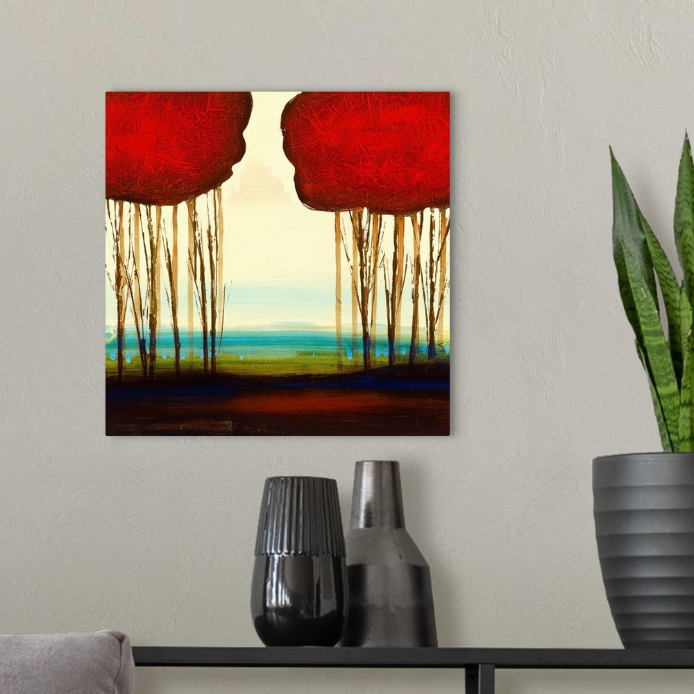 A modern room featuring A piece of contemporary artwork that shows two groupings of trees that have red tops. The bottom ...
