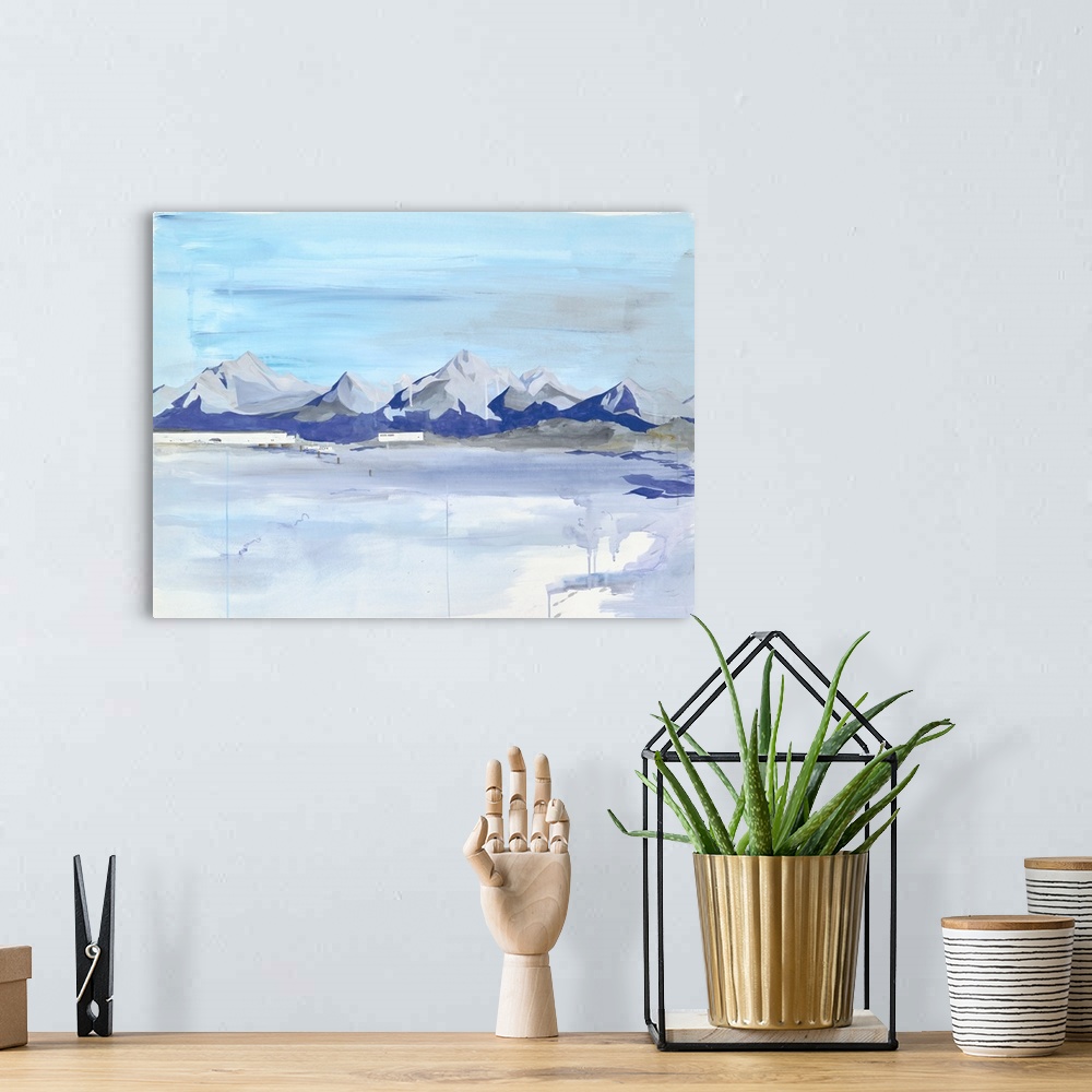 A bohemian room featuring Contemporary painting of a mountain range on the horizon.