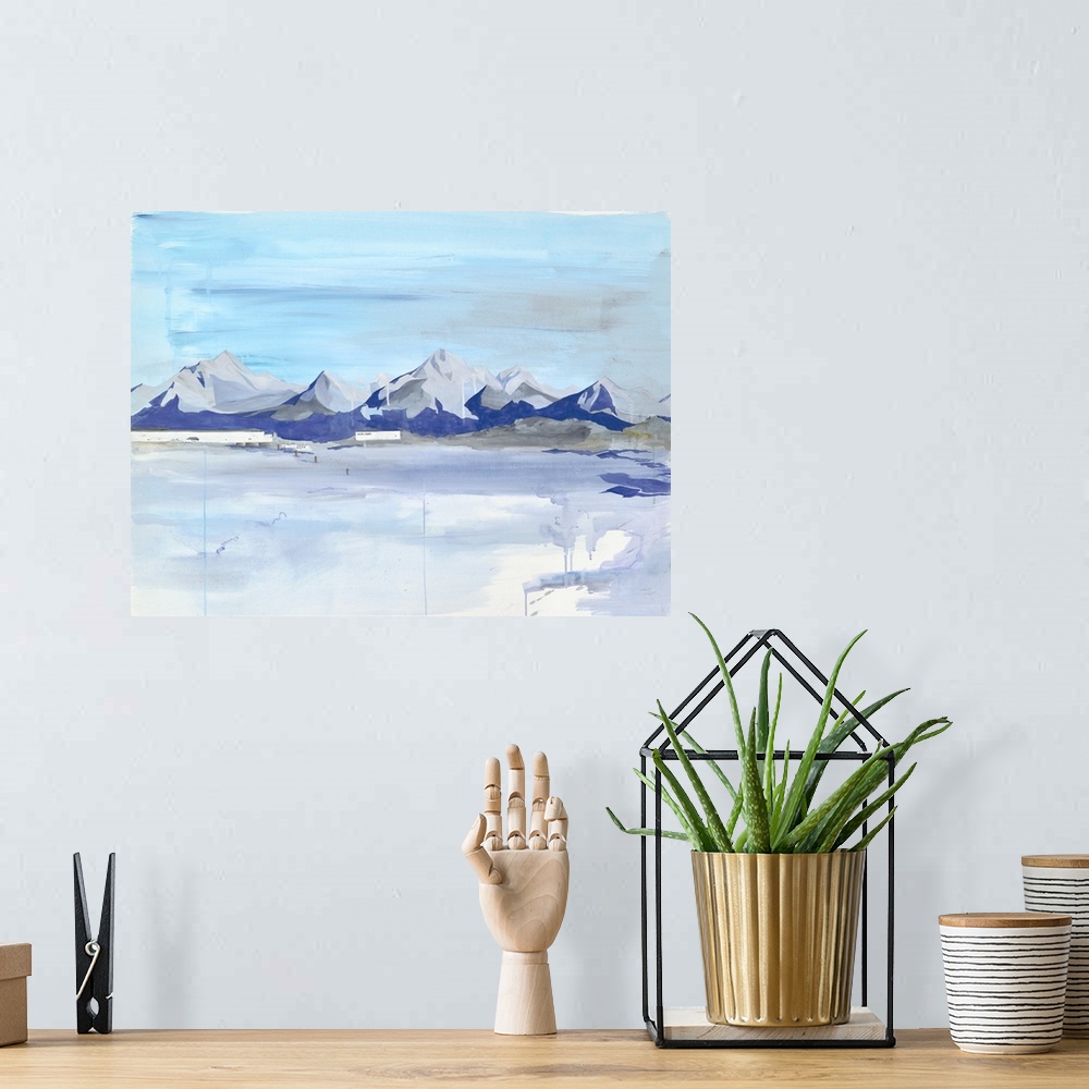 A bohemian room featuring Contemporary painting of a mountain range on the horizon.