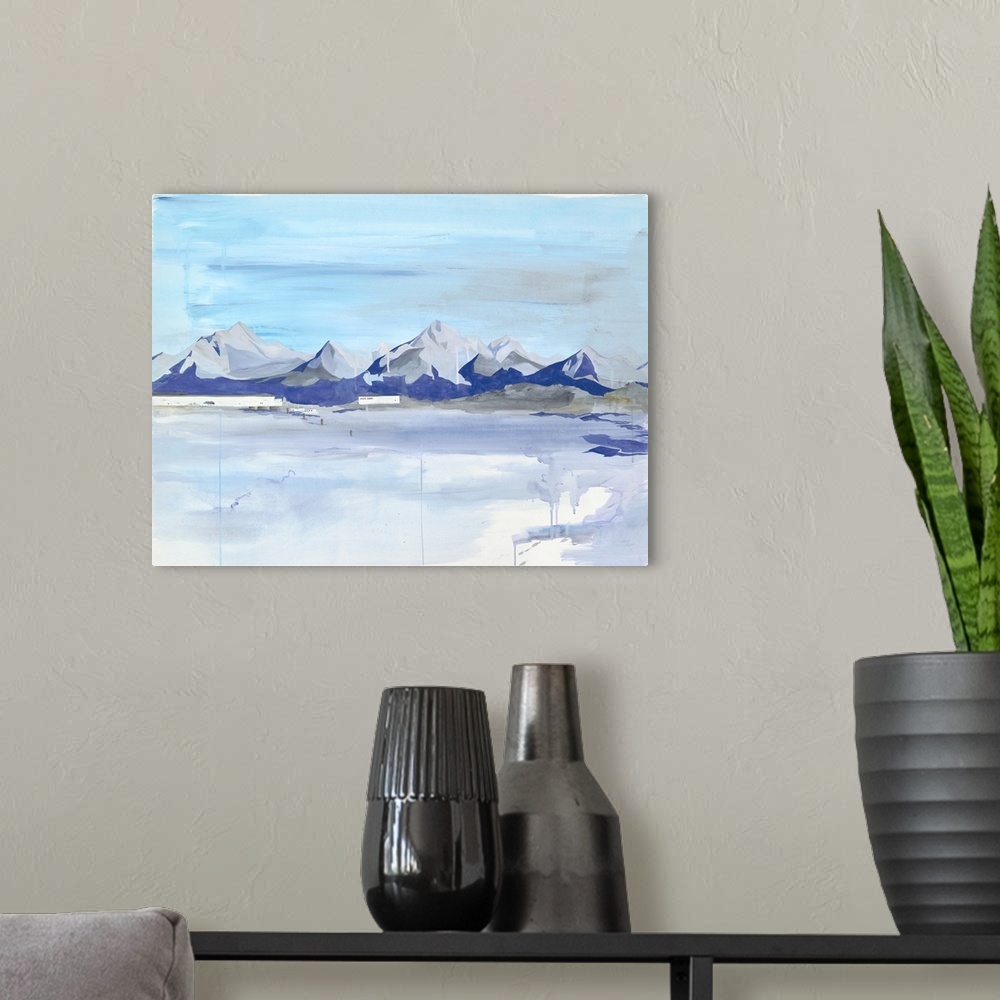 A modern room featuring Contemporary painting of a mountain range on the horizon.