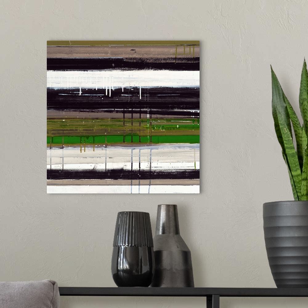 A modern room featuring Abstract artwork of dripping layers of paint in white, black, and green.