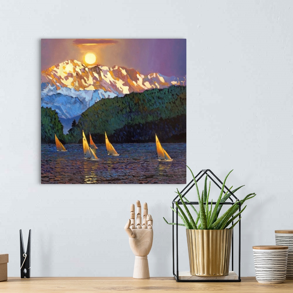 A bohemian room featuring Contemporary painting of five sailboats on the water with the sun setting over a tall mountain peak.