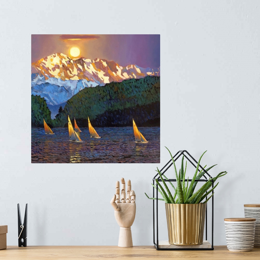 A bohemian room featuring Contemporary painting of five sailboats on the water with the sun setting over a tall mountain peak.