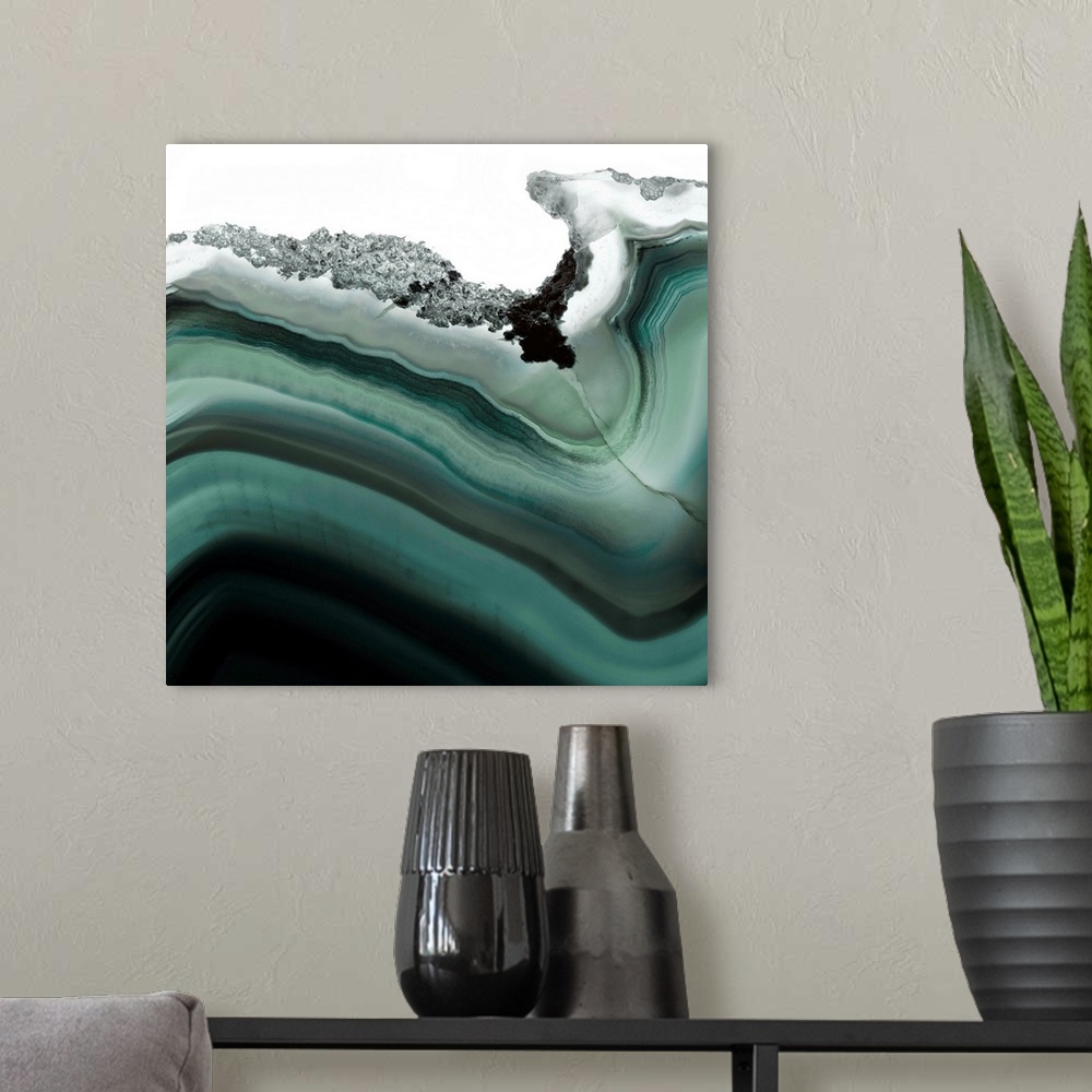 A modern room featuring A macro photograph of agate in dark green and black.
