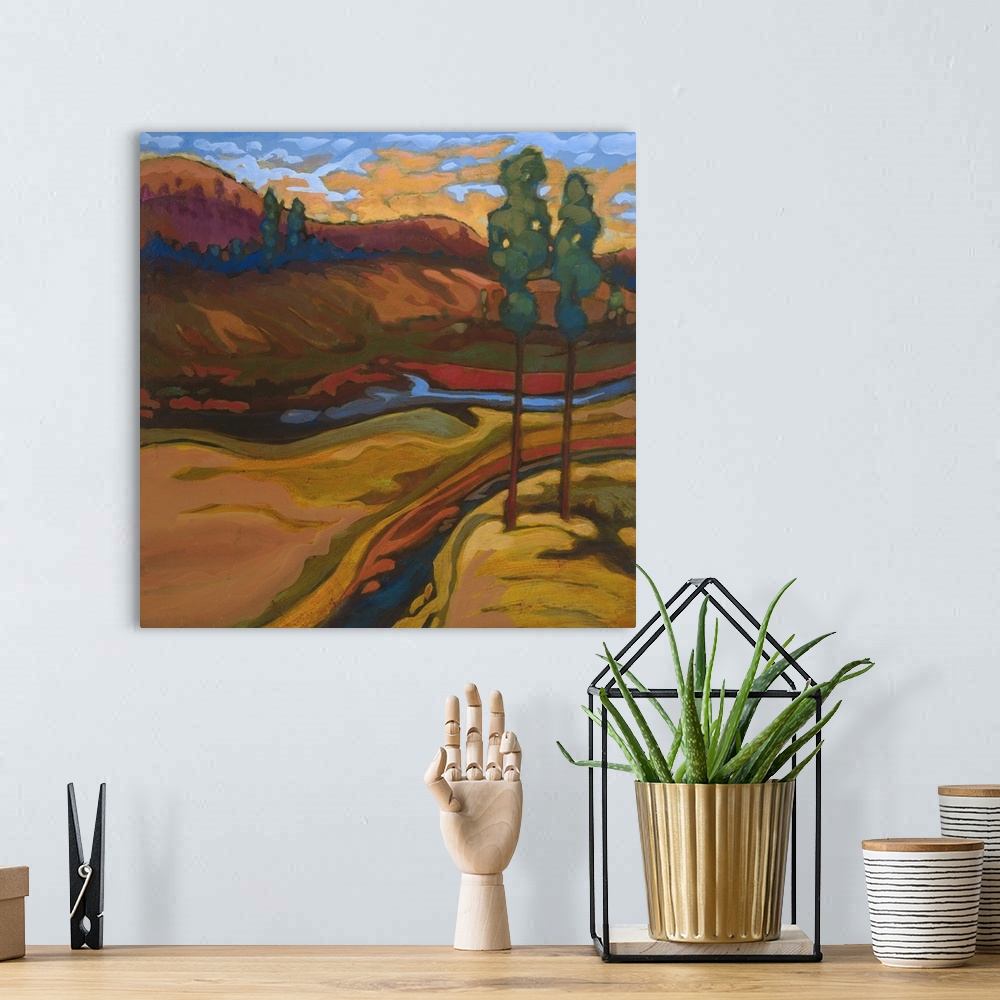 A bohemian room featuring Contemporary landscape painting of a river valley in autumn colors.