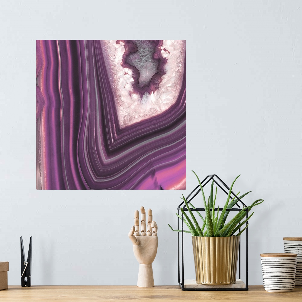 A bohemian room featuring Patterns on a purple polished geode gemstone.