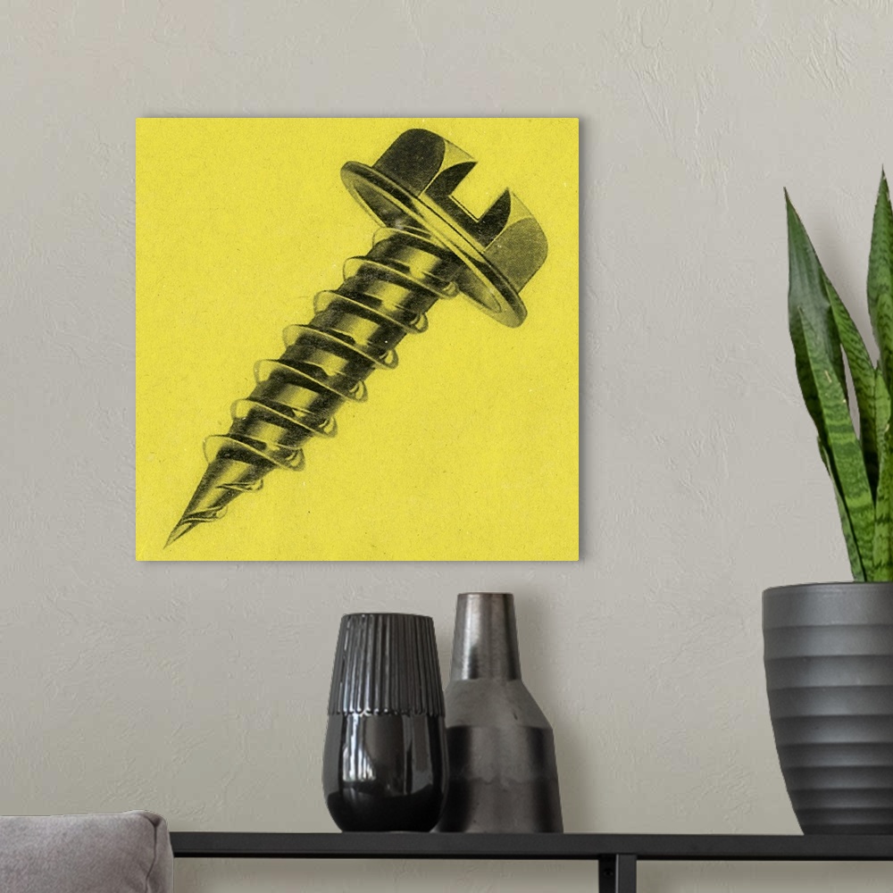 A modern room featuring Square art of a screw on a yellow background.