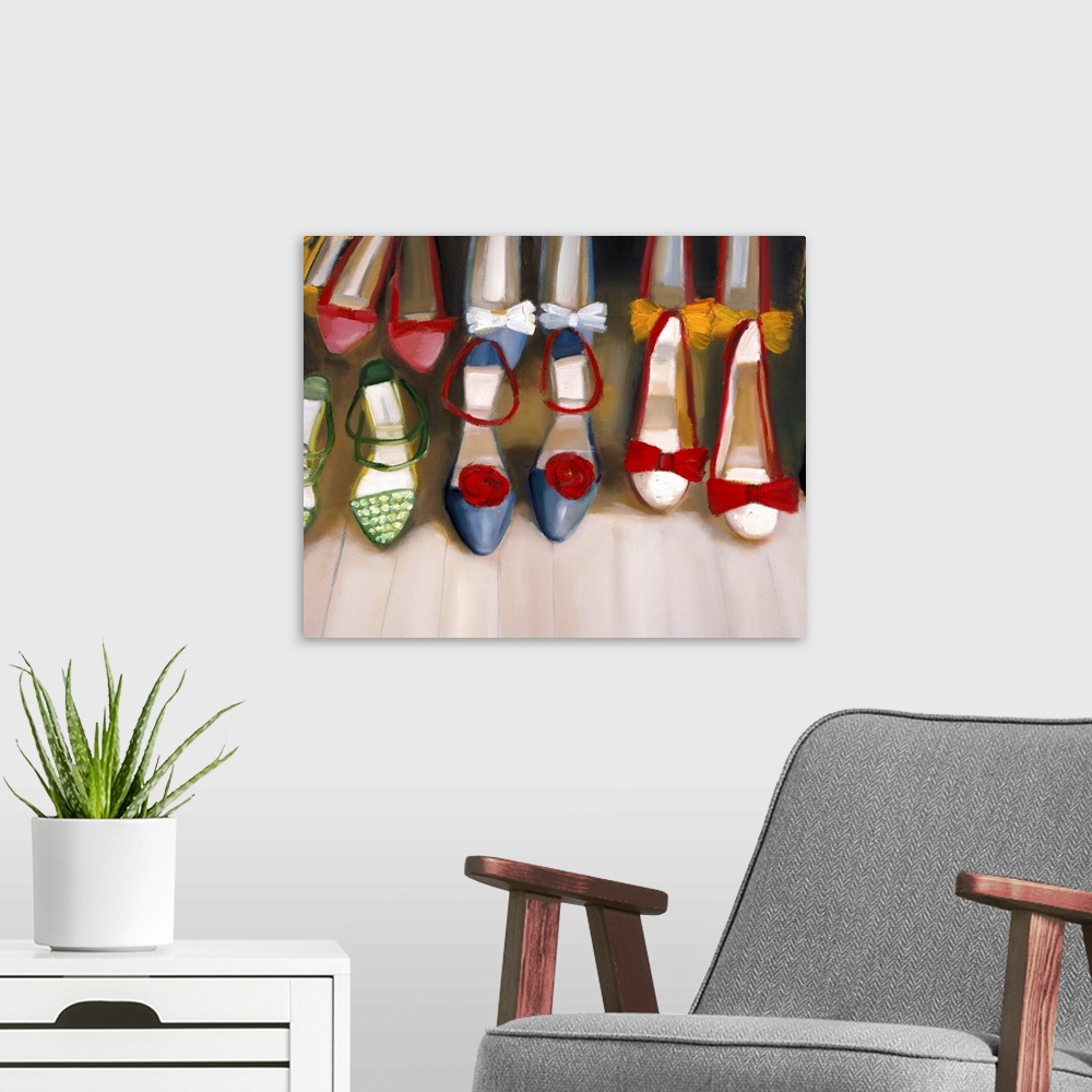 A modern room featuring Big painting on canvas of different pairs of shoes lined up in two rows.