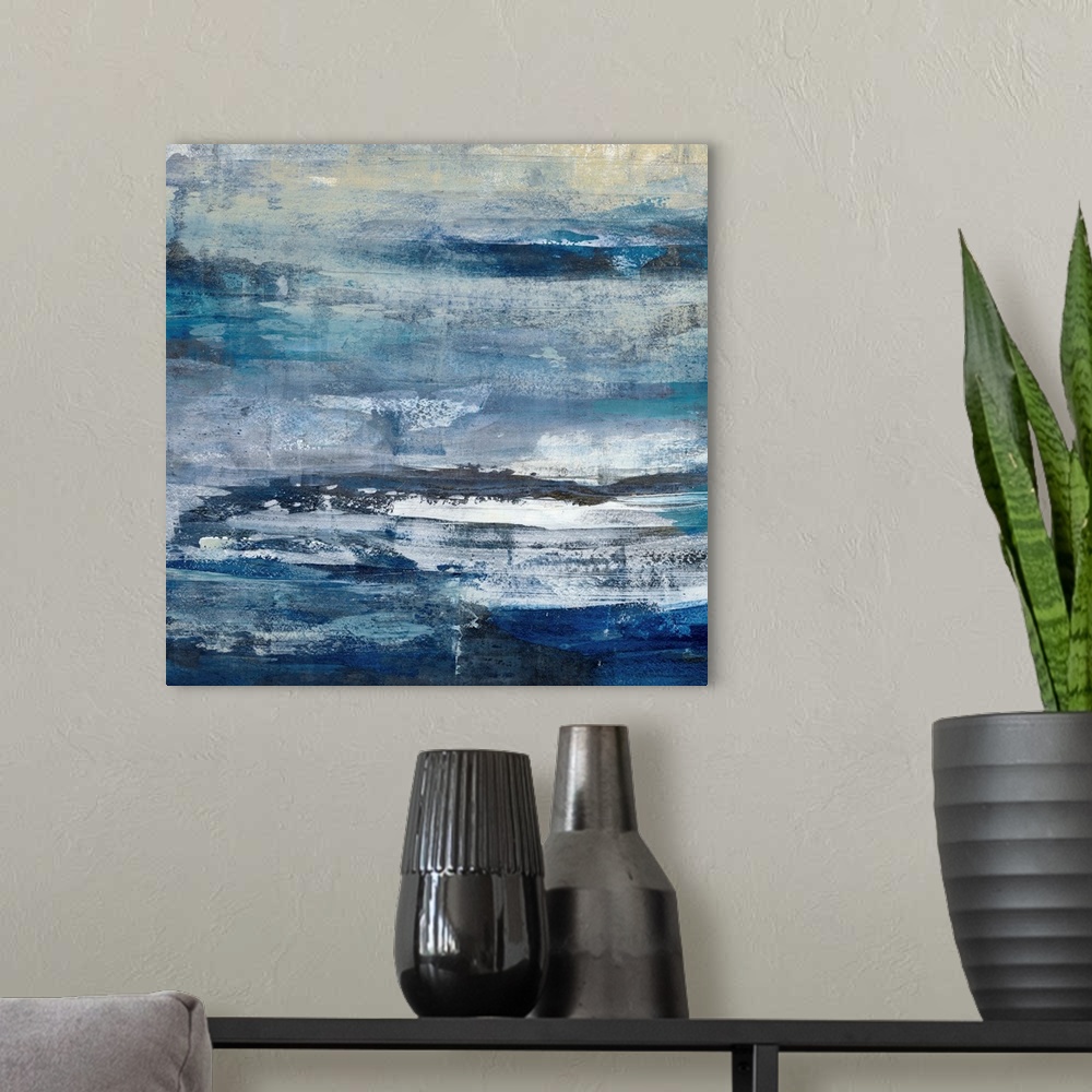 A modern room featuring Contemporary abstract painting using a variety of blue tones.