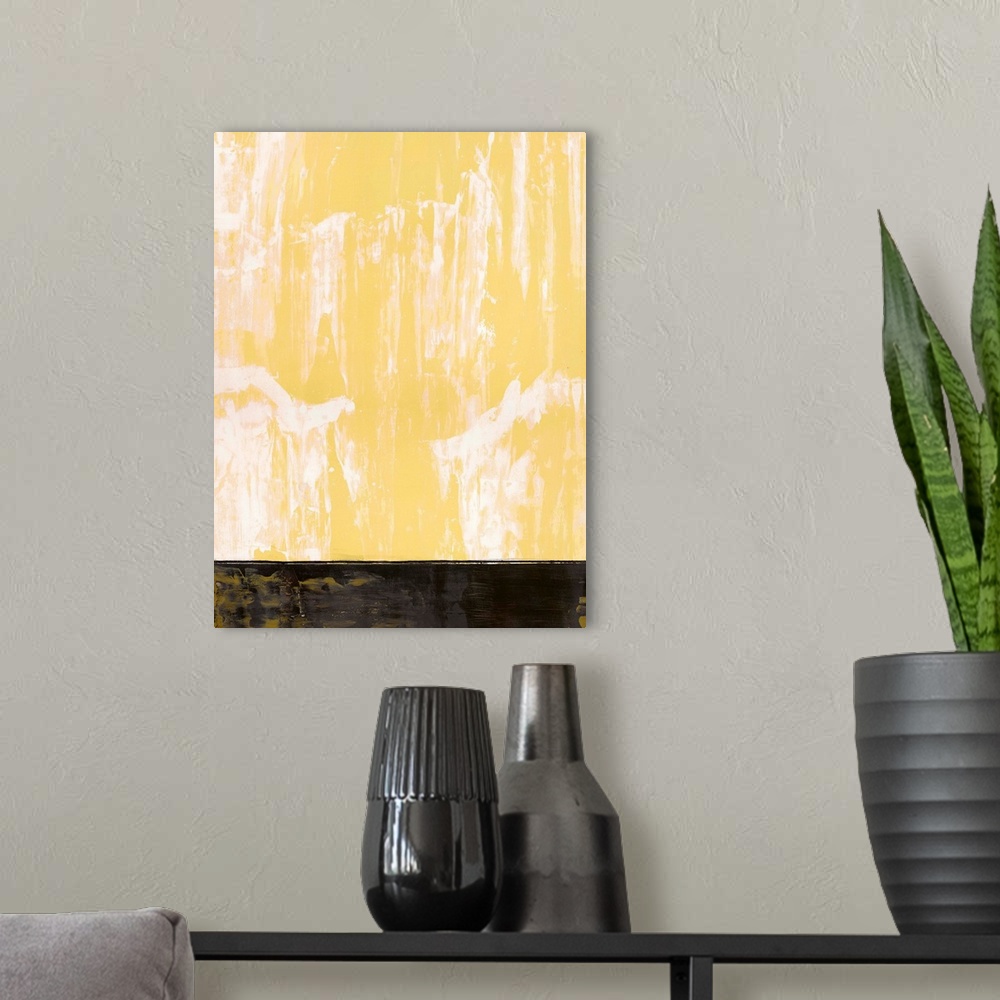 A modern room featuring Large abstract painting with a pastel yellow and white hue at the top and a black rectangular sec...