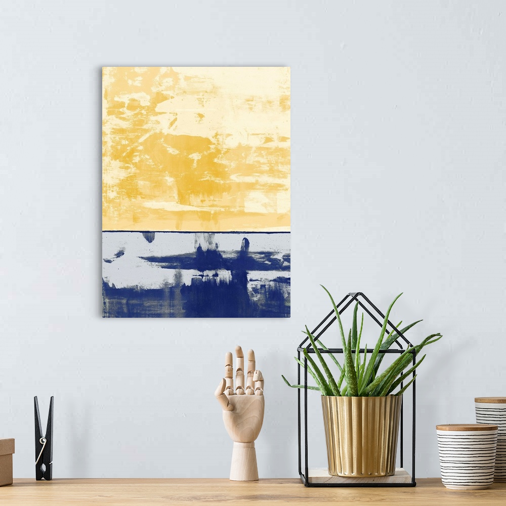 A bohemian room featuring Large abstract painting with pale yellow and gold hues at the top and a royal blue section at the...