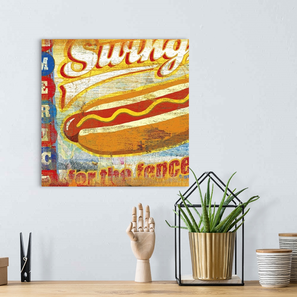 A bohemian room featuring Vintage poster of a cartoon like hot dog with faded text surrounding it.