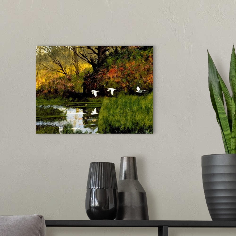 A modern room featuring Contemporary painting of three egrets flying over lush wetlands.