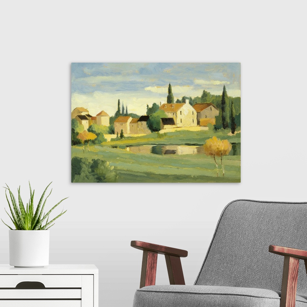 A modern room featuring Landscape painting with quaint country houses.