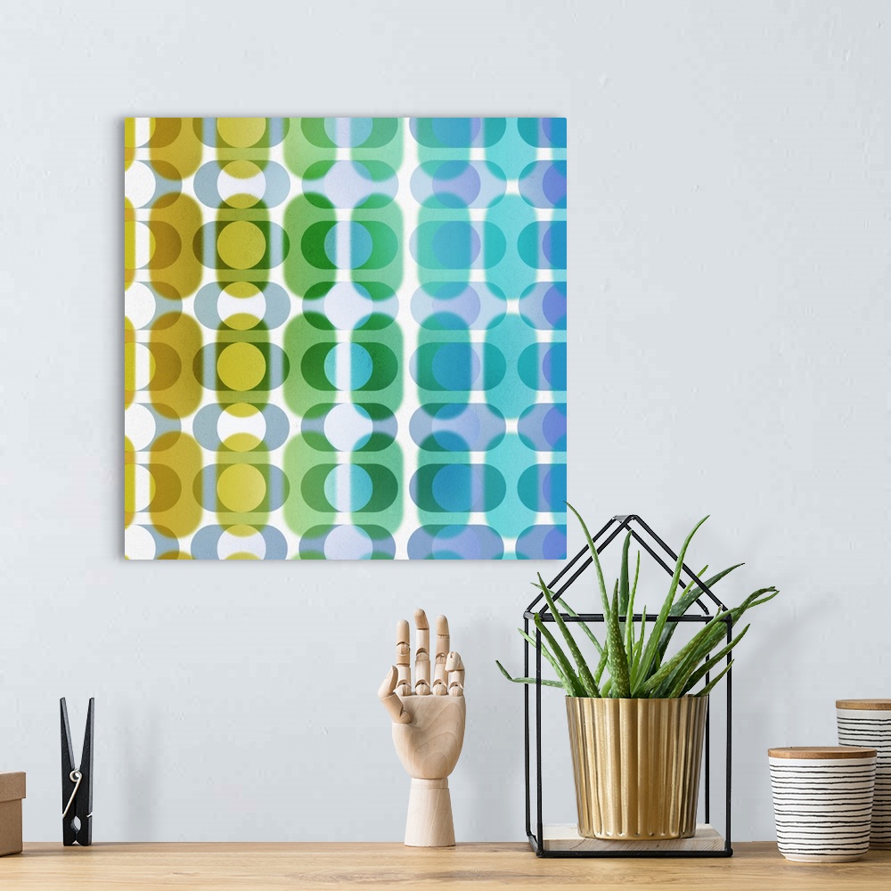 A bohemian room featuring Patterned abstract art using geometric oblong shapes and circles layered on top of each other in ...