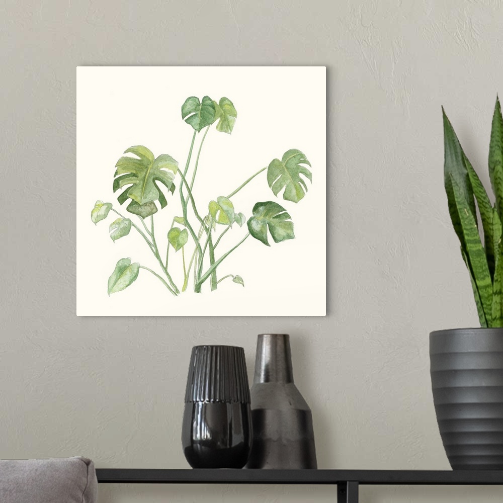A modern room featuring Square watercolor painting of tropical leaves on an off white background.