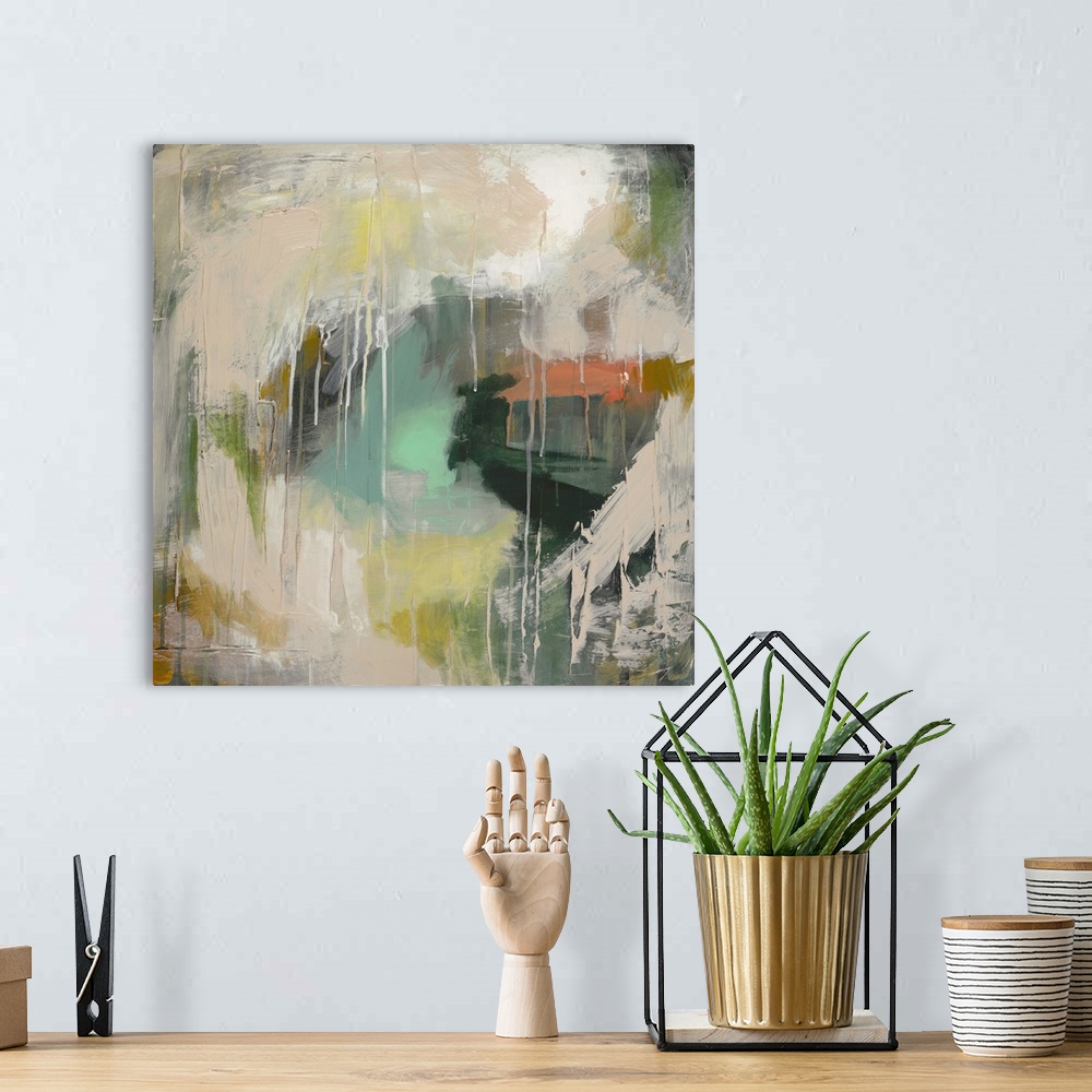 A bohemian room featuring Square abstract painting with neural toned brushstrokes creating a drippy circle that resembles a...