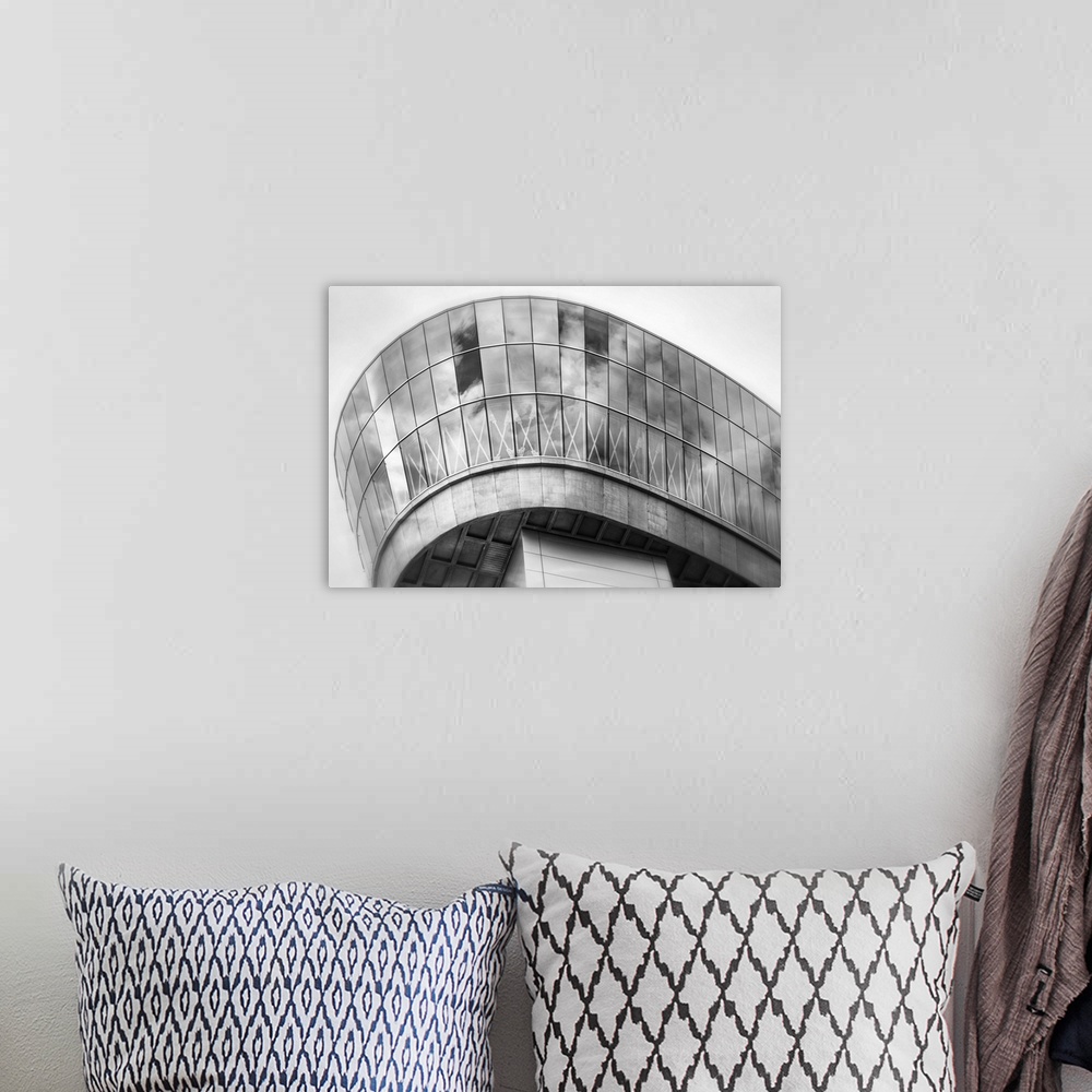 A bohemian room featuring A fine art photograph of modern architectural attributes.