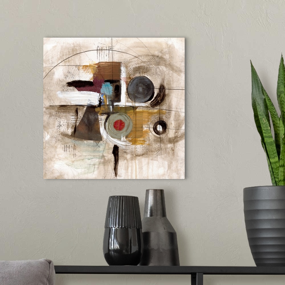A modern room featuring Abstract artwork with different designs and muted colors that are focused in the center of this p...