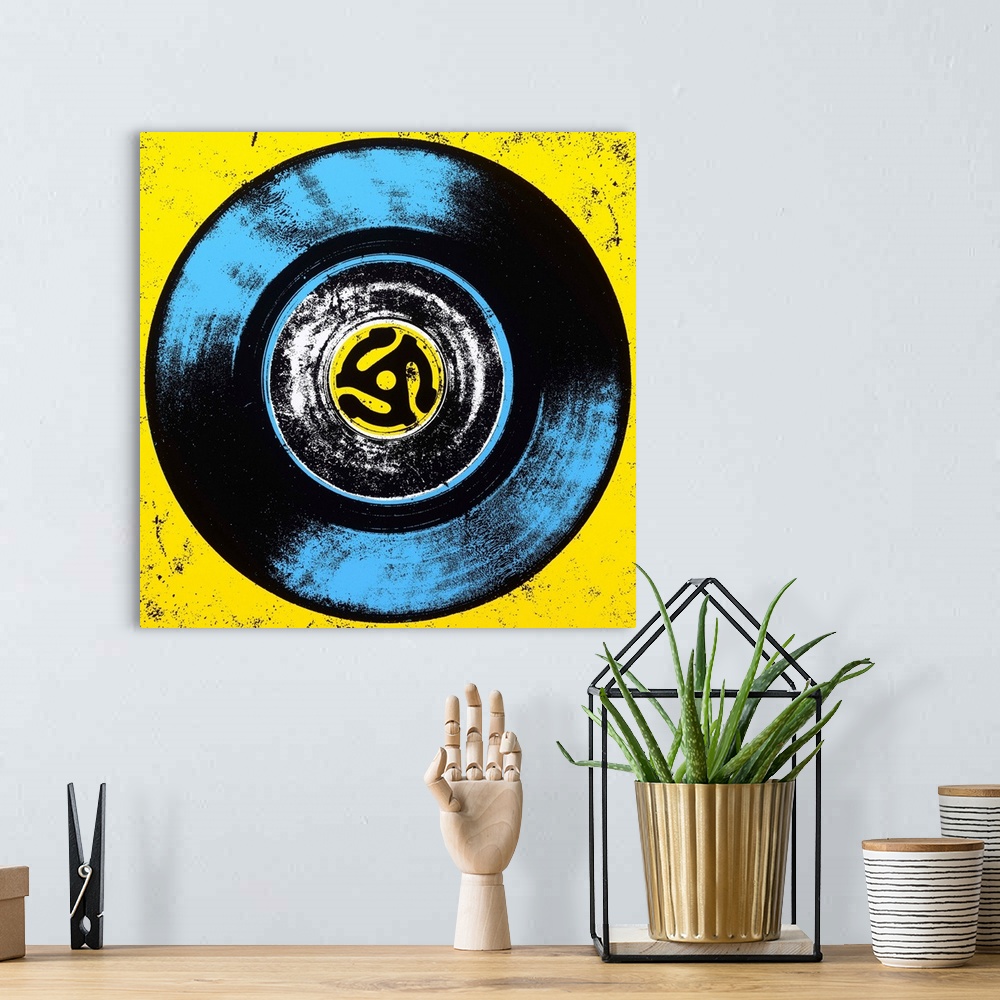 A bohemian room featuring Contemporary pop art style artwork of a vinyl against a yellow background.