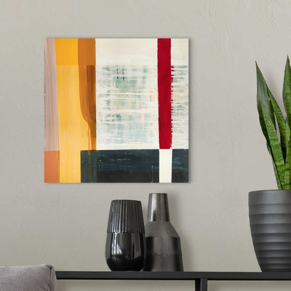 A modern room featuring Square abstract painting created using four sided shapes layered together.