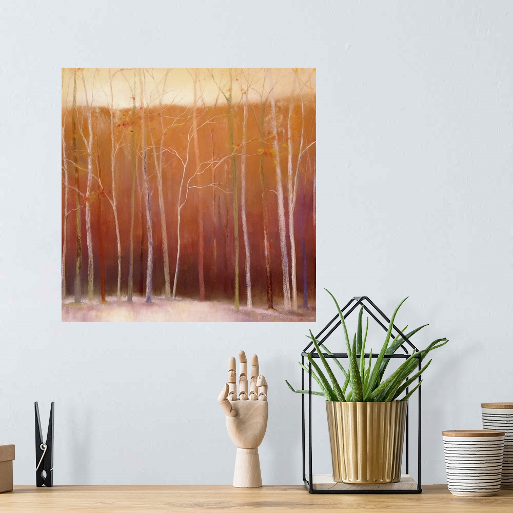 A bohemian room featuring Square painting on canvas of bare trees in winter.