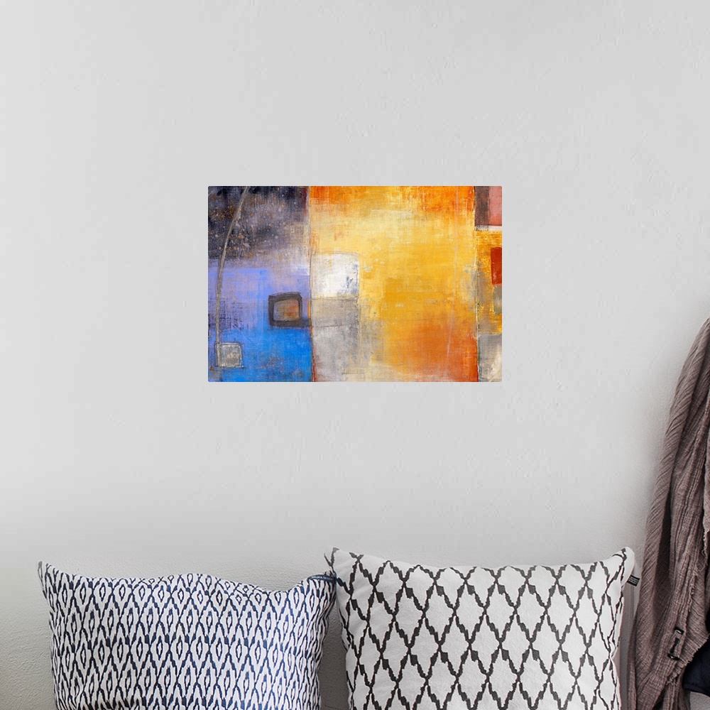 A bohemian room featuring Abstract artwork that has different blocks of color that has smaller blocks laid over top.