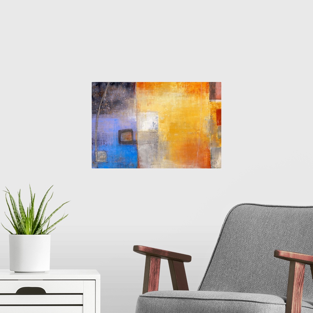 A modern room featuring Abstract artwork that has different blocks of color that has smaller blocks laid over top.