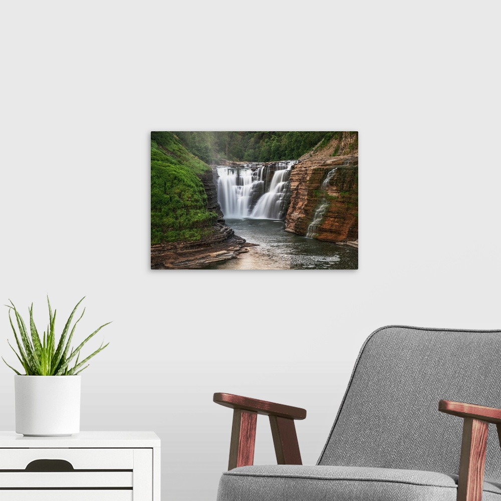 A modern room featuring The Upper Falls of the Genesee River is the first of many amazing views just inside the south ent...