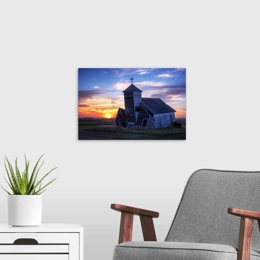 A modern room featuring Another day ends with a brilliant sunset at the old St. Johns Lutheran Church in the ghost town o...