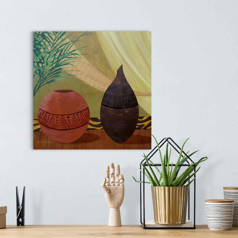 A bohemian room featuring Square still life painting of two African pots with lined designs.