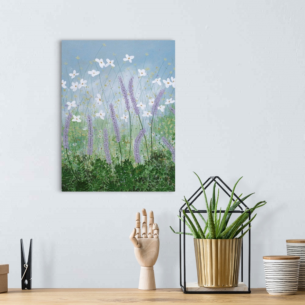 A bohemian room featuring Contemporary painting of purple, white, and yellow wildflowers in a grassy field with a dusty blu...
