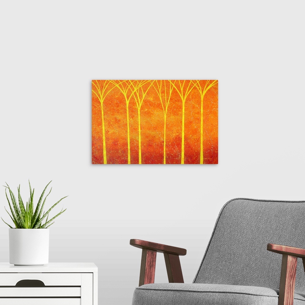A modern room featuring Warm landscape with bright yellow trees on an orange and red background with faint paint splatter.