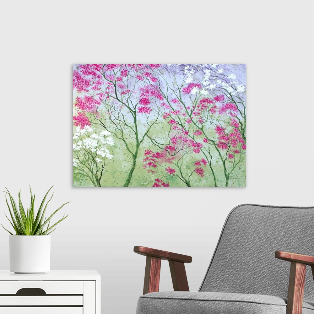A modern room featuring Colorful painting of tree tops with pink, purple, and white blossoms on a green background.