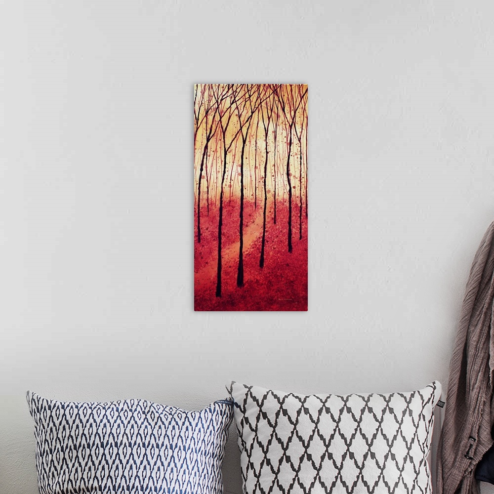 A bohemian room featuring Panel painting of a tree landscape in shades of red and gold with paint splatter in the background.