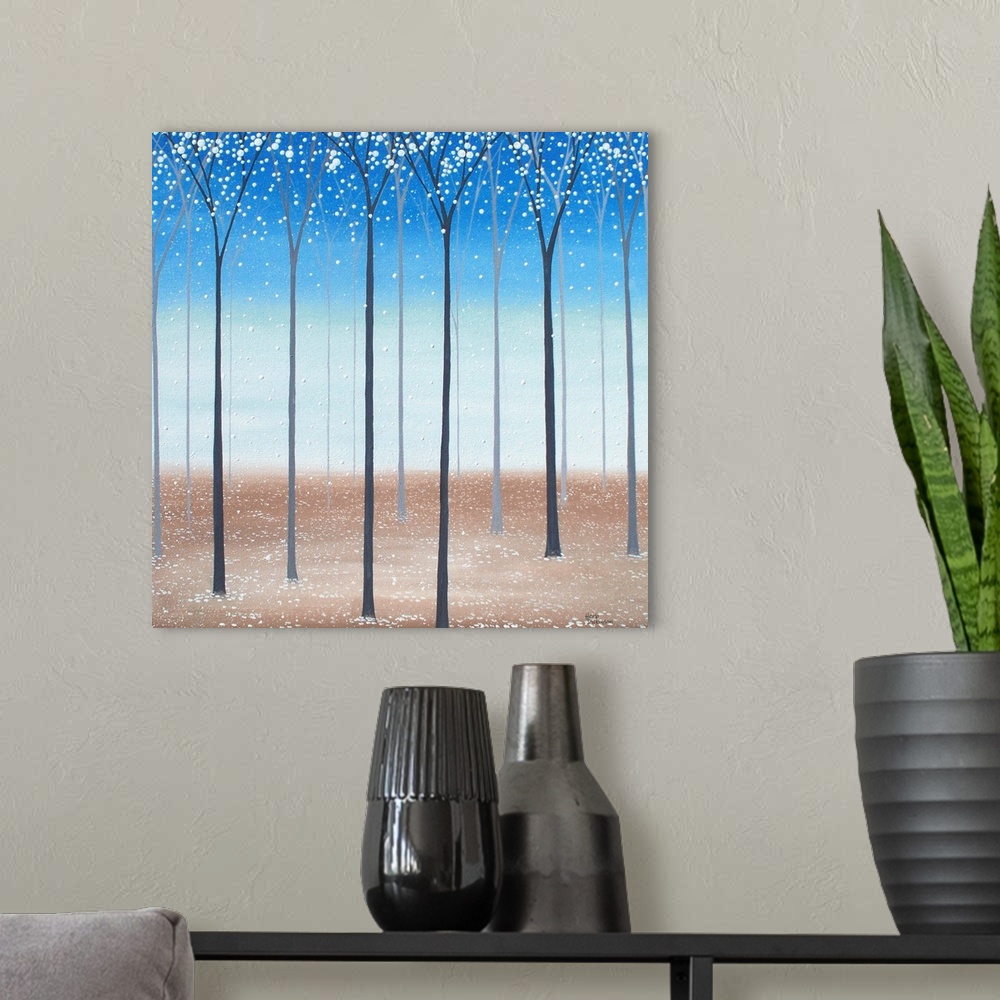 A modern room featuring Square minimalist painting of tall, skinny trees with white blossoms falling to the ground.