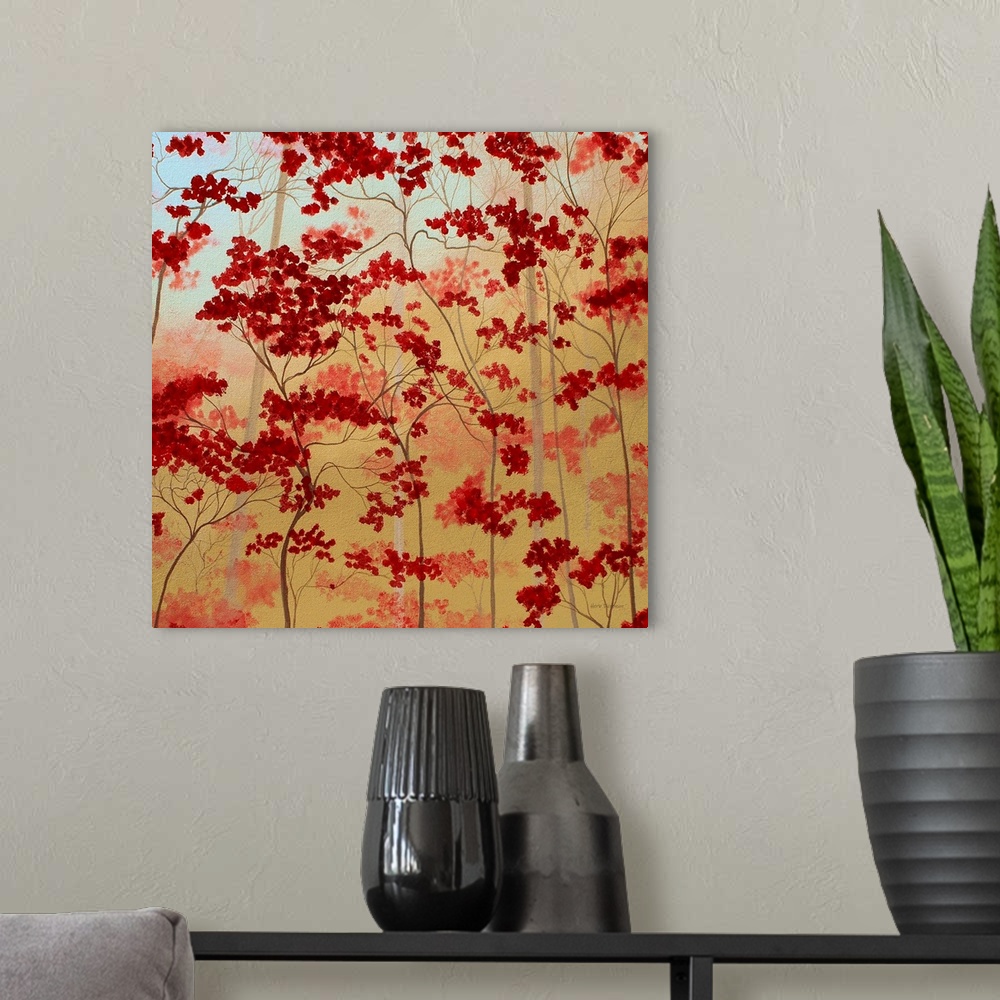 A modern room featuring Painting of bold red trees on a golden background.