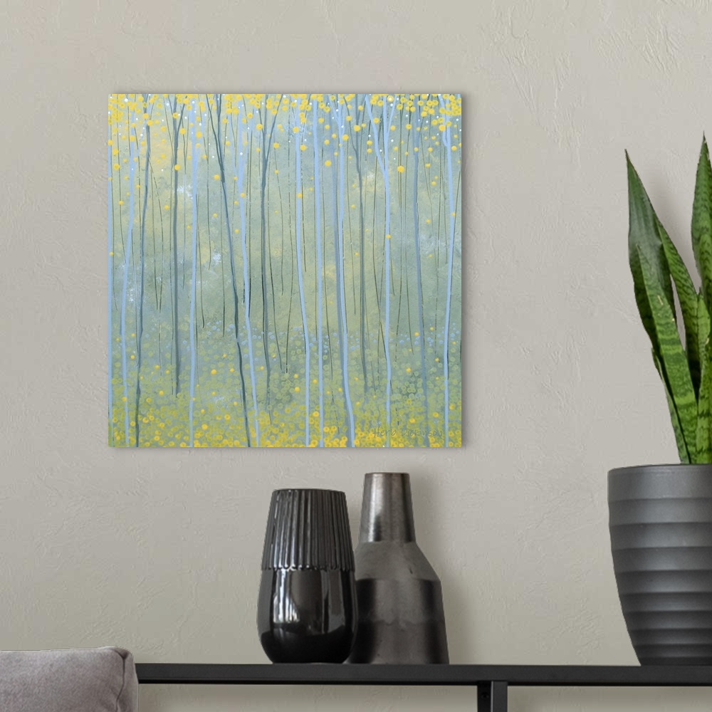 A modern room featuring Square painting of tall and skinny Ginkgo trees with yellow leaves above and below.