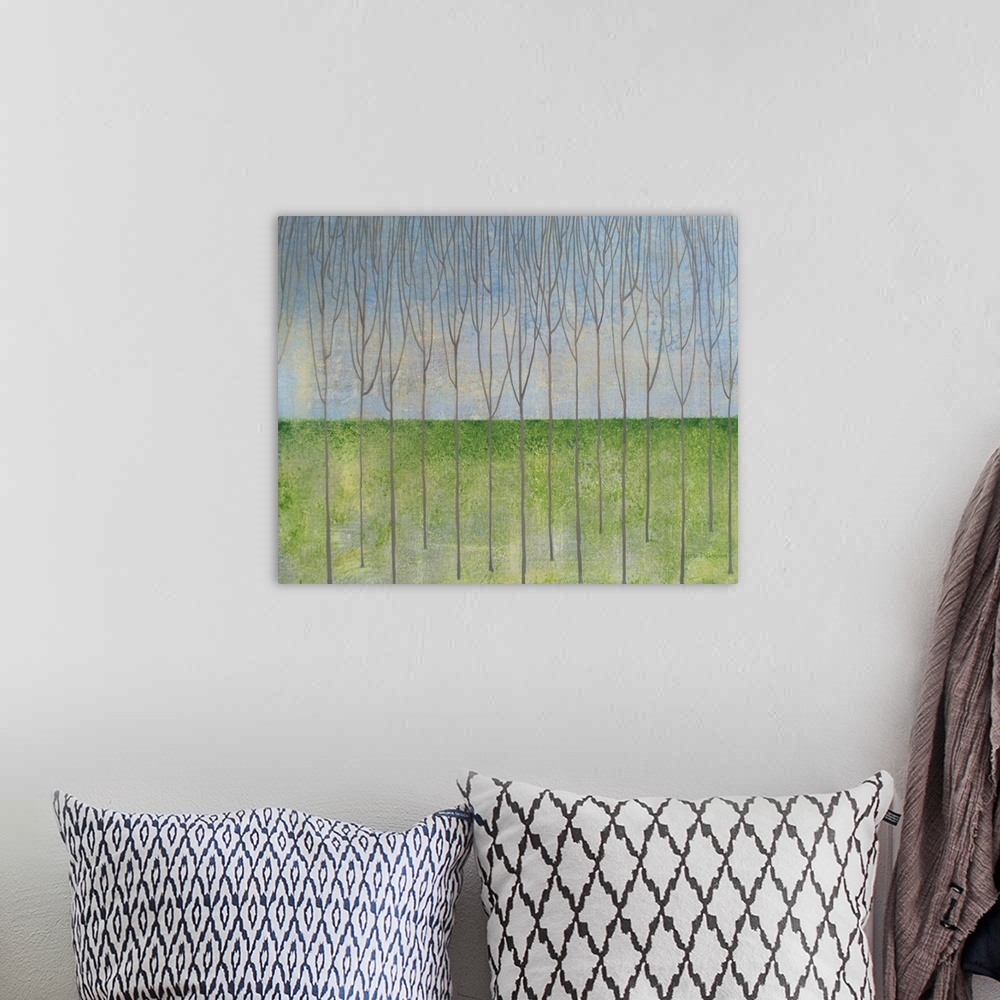 A bohemian room featuring Minimalist abstract landscape with thin bare trees and green grass.
