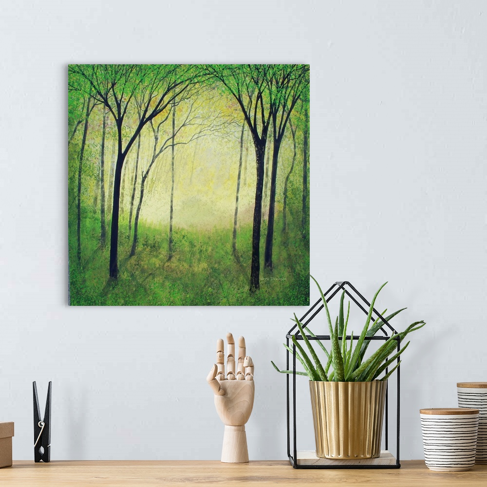 A bohemian room featuring Square landscape painting of a green and and yellow forest filled with trees.