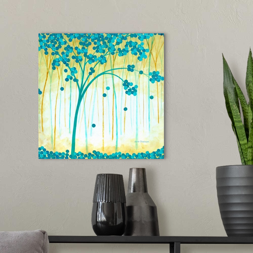 A modern room featuring Contemporary square painting of blue and gold trees with blue circular leaves.