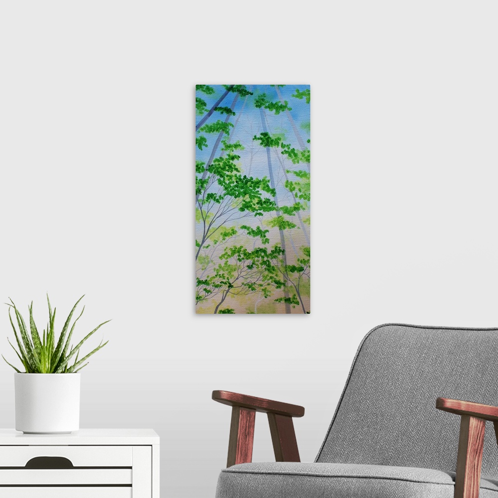 A modern room featuring Panel painting of green tree tops with blue skies.