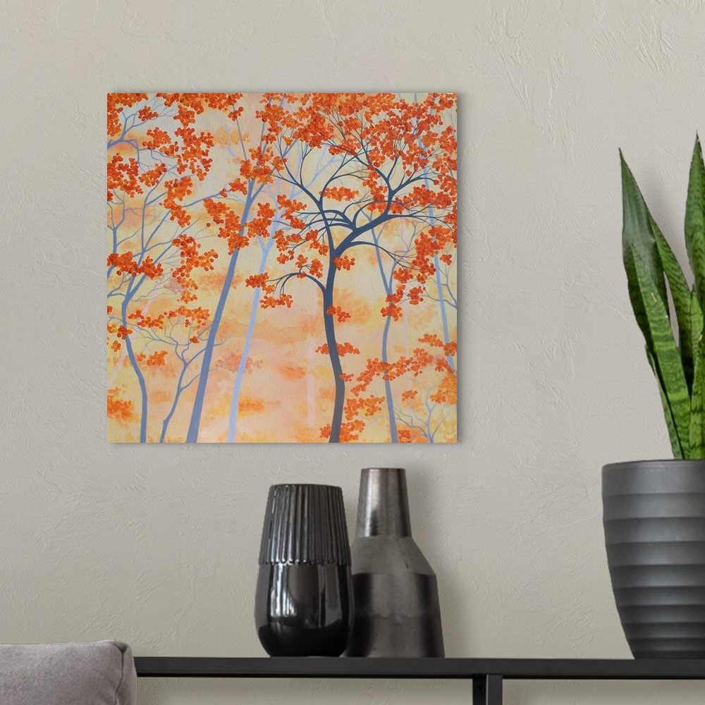 A modern room featuring Square painting of orange Autumn trees with a light orange background.