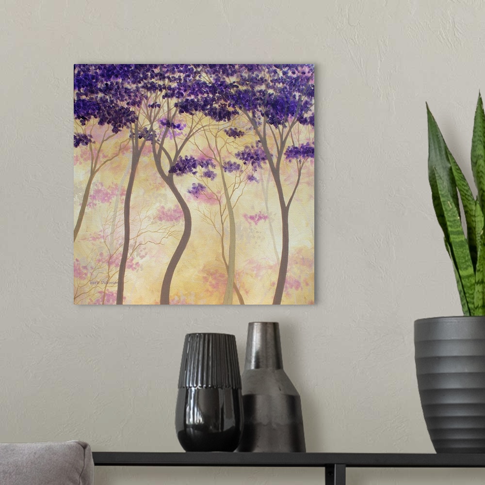 A modern room featuring Contemporary painting of wavy trees with bright purple leaves with an orange and yellow background.
