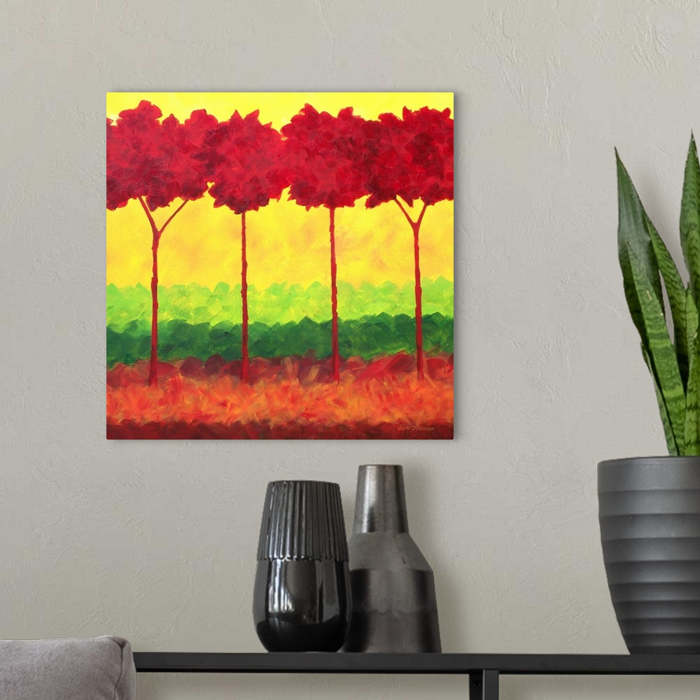 A modern room featuring Colorful landscape with bold red trees and a background made with layers of green, red, and yellow.