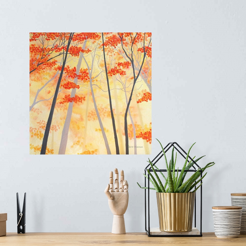 A bohemian room featuring Square painting of Autumn trees with orange and yellow leaves.