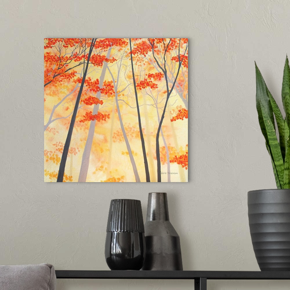 A modern room featuring Square painting of Autumn trees with orange and yellow leaves.